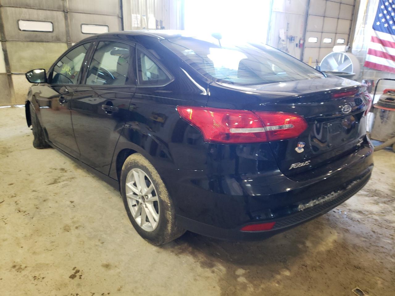 Photo 3 from auction – 2016 FORD FOCUS SE with VIN 1FADP3F23GL310150