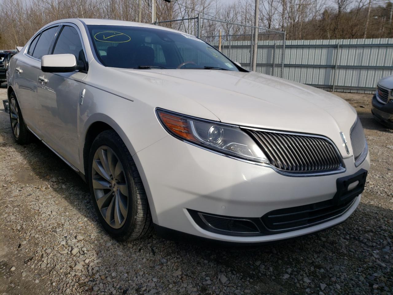 LINCOLN MKS 2014 with VIN 1LNHL9FT0EG607235 - Photo from auction