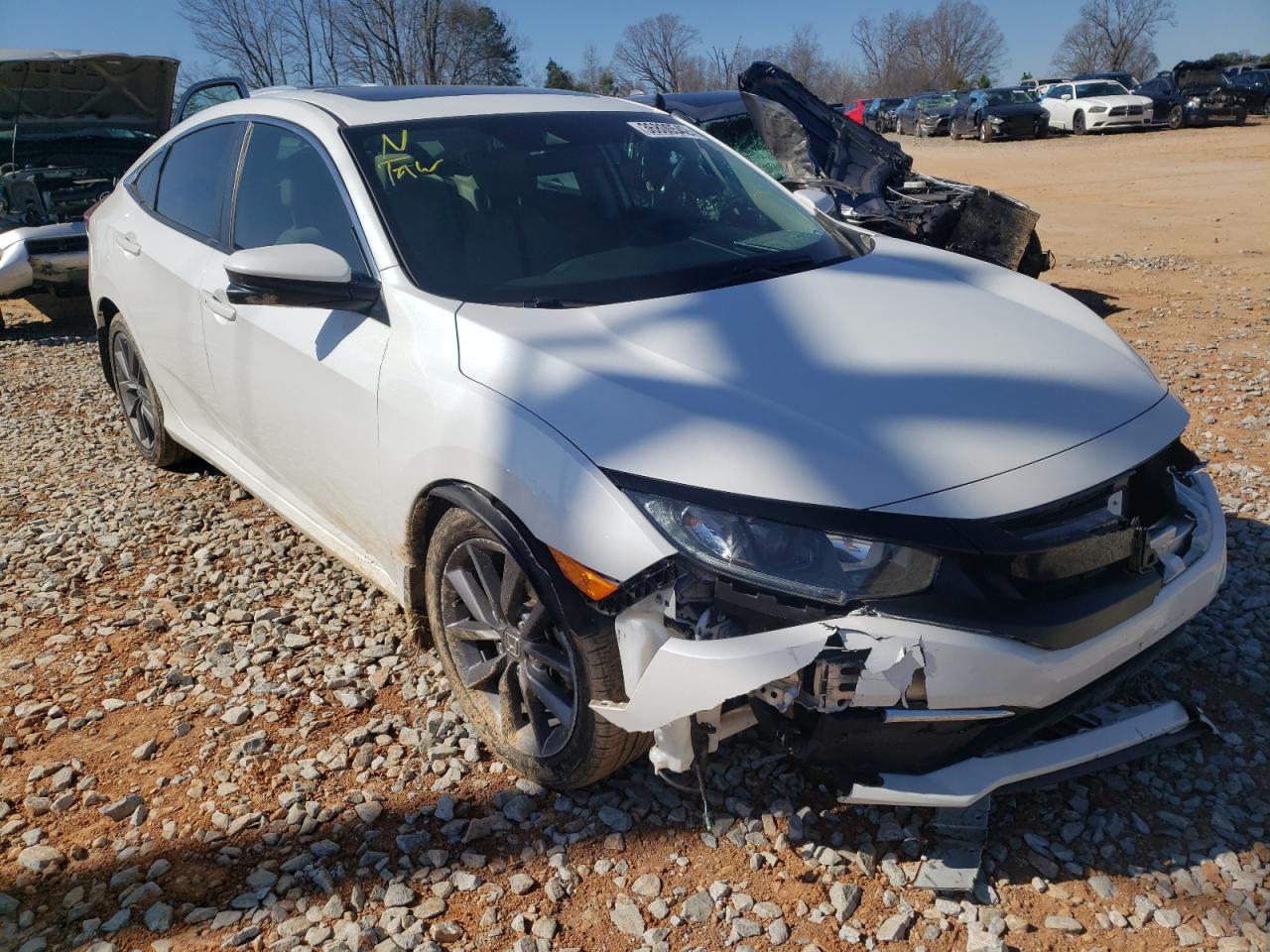 HONDA CIVIC EX 2019 with VIN 19XFC1F38KE002209 - Photo from auction