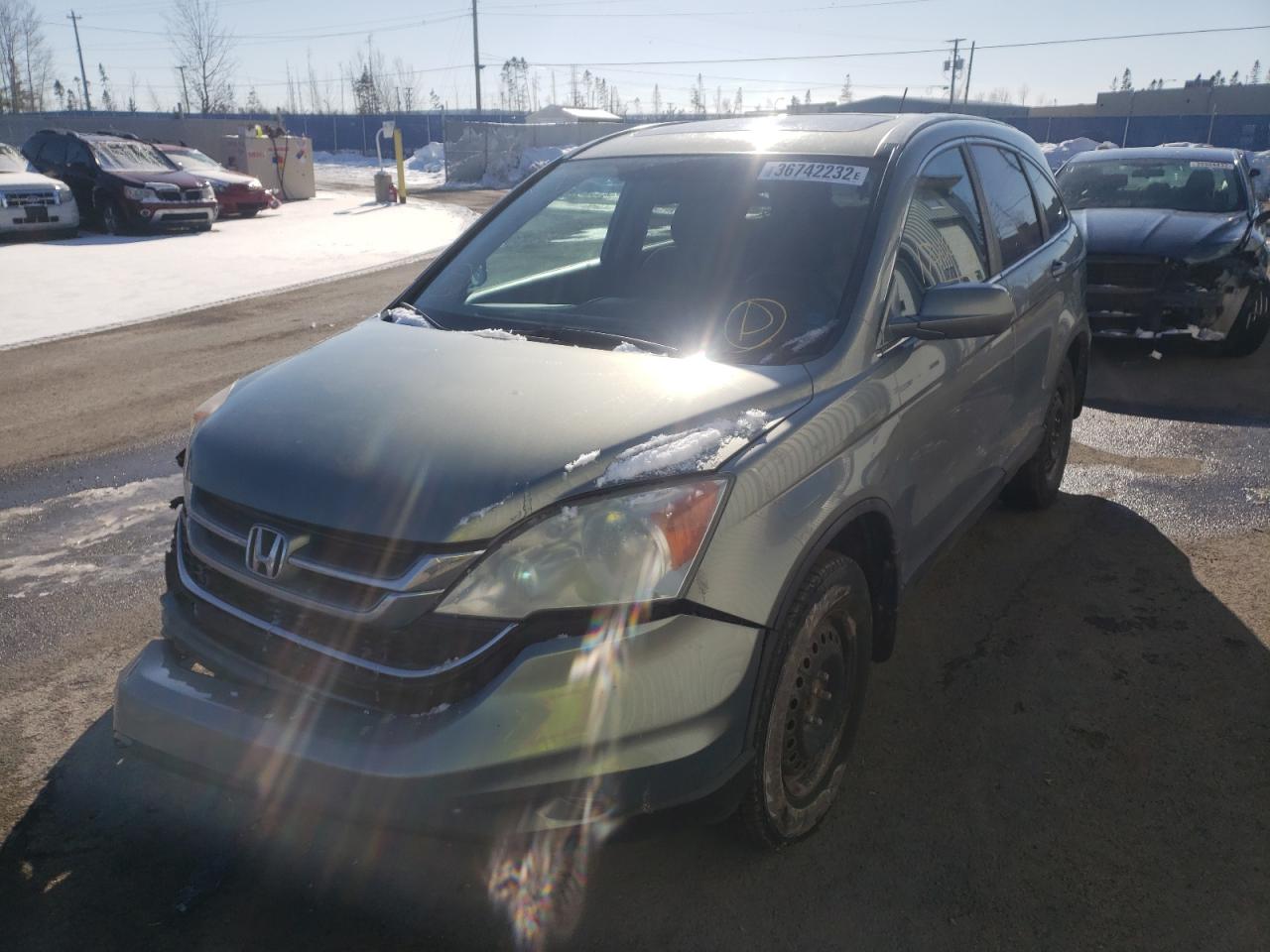 Photo 2 from auction – 2011 HONDA CR-V EX with VIN 5J6RE4H57BL803495