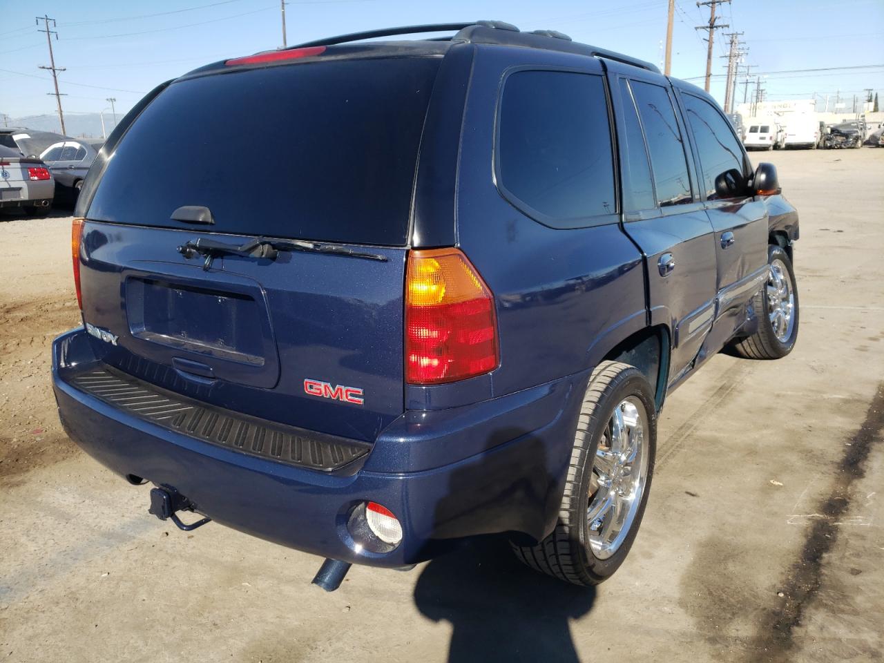 Photo 4 from auction – 2004 GMC ENVOY with VIN 1GKDS13S042128087