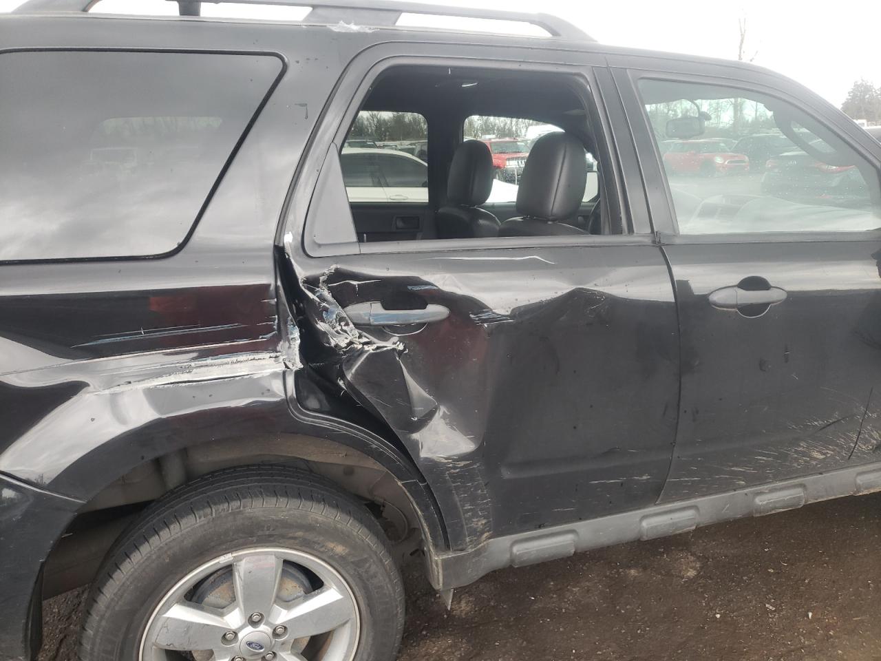 Photo 9 from auction – 2011 FORD ESCAPE XLT with VIN 1FMCU0DG6BKB82296