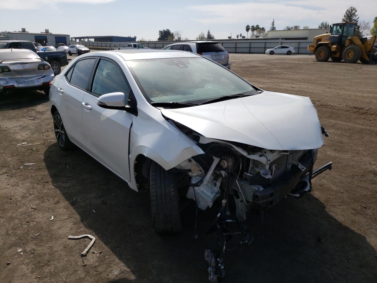 TOYOTA COROLLA L 2017 with VIN 5YFBURHE4HP661405 - Photo from auction
