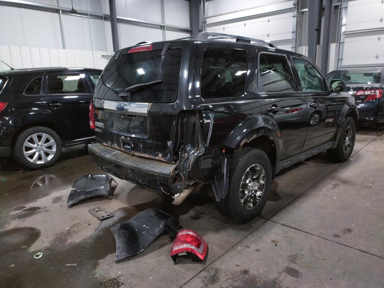 Photo 4 from auction – 2011 FORD ESCAPE LIM with VIN 1FMCU9E7XBKB02792