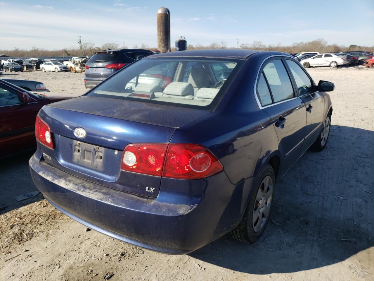 Photo 4 from auction – 2006 KIA OPTIMA LX with VIN KNAGE123365053653