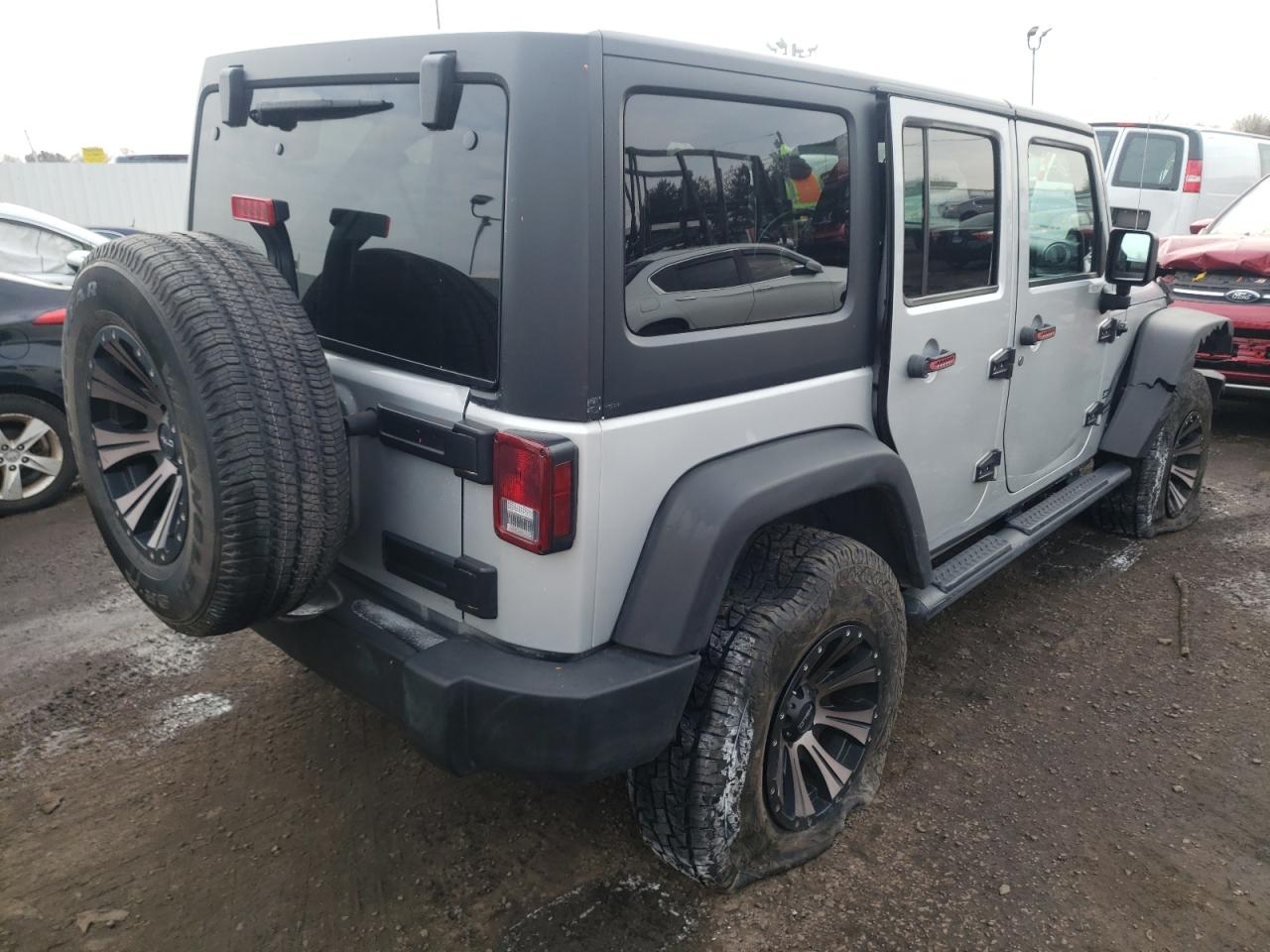 Photo 4 from auction – 2012 JEEP WRANGLER U with VIN 1C4HJWDG0CL150140