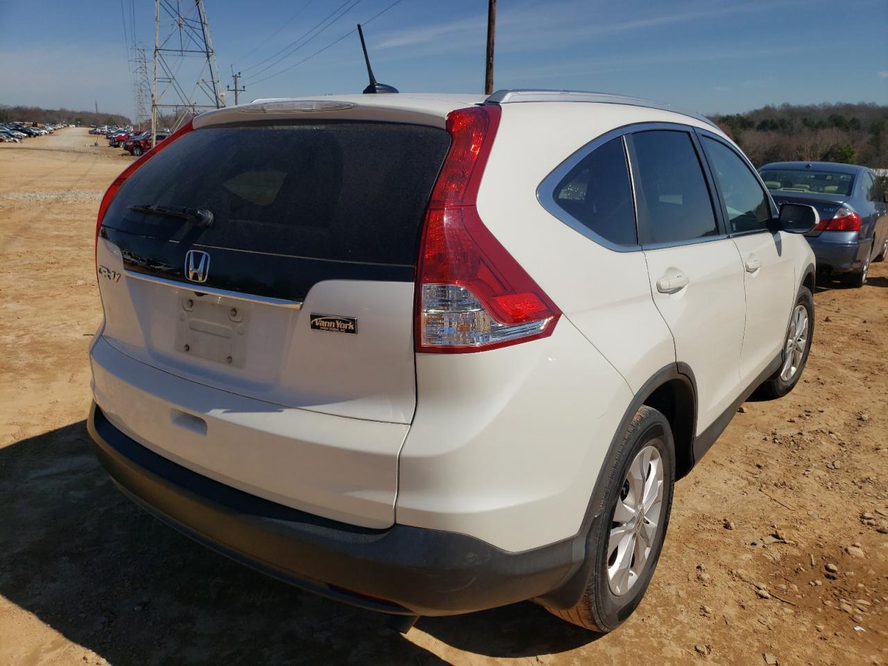 Photo 4 from auction – 2012 HONDA CR-V EXL with VIN 5J6RM3H76CL043205