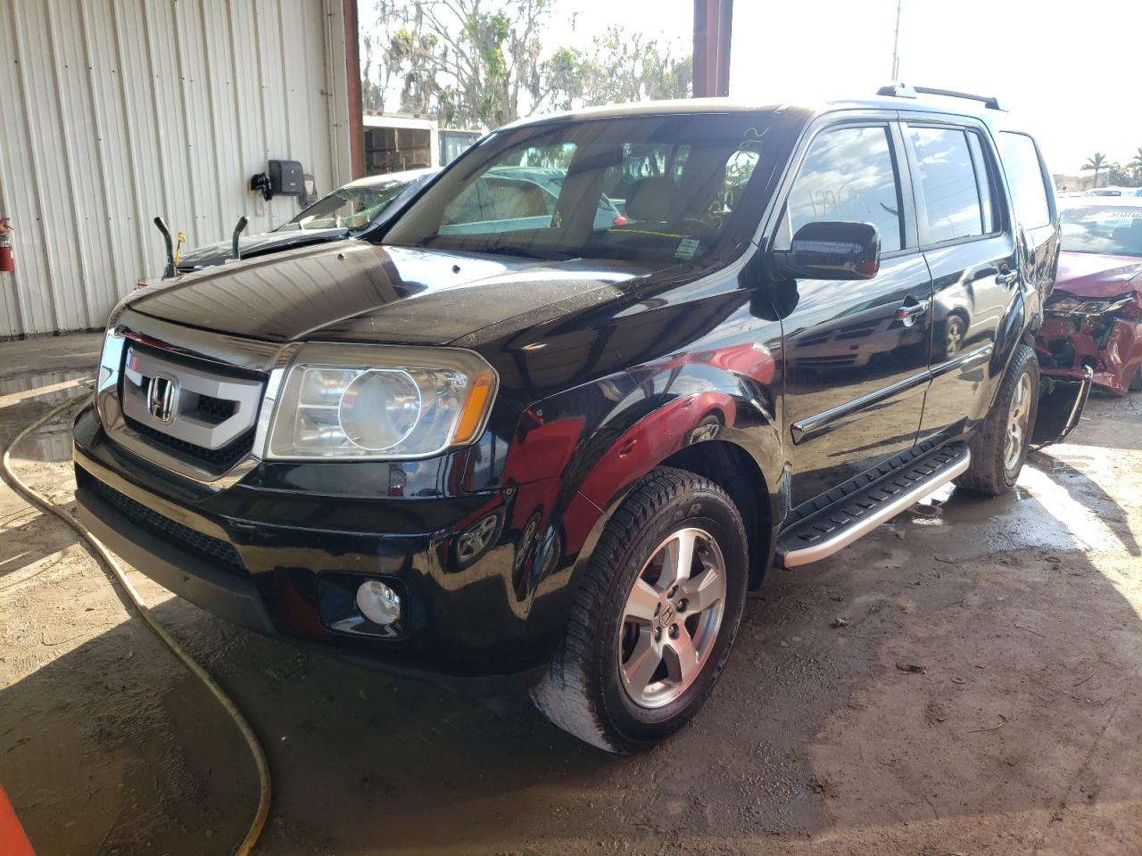 Photo 2 from auction – 2010 HONDA PILOT EXL with VIN 5FNYF3H57AB008571