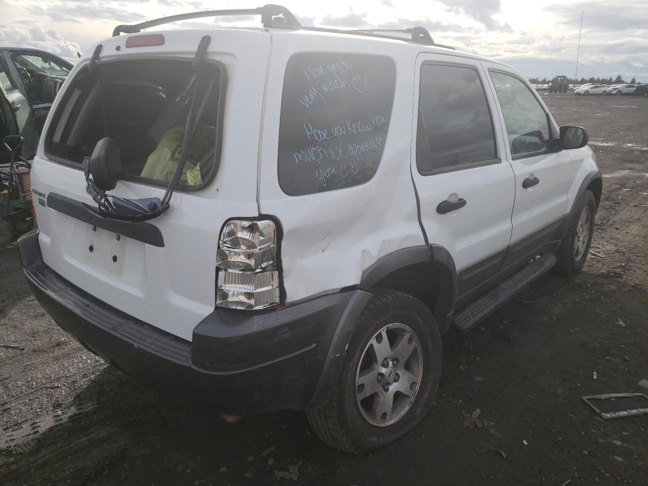 Photo 4 from auction – 2004 FORD ESCAPE with VIN 1FMCU03164KB20297