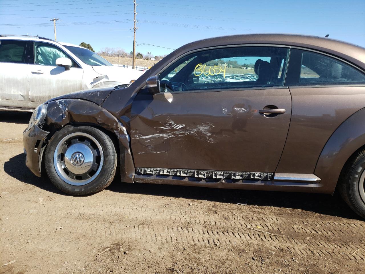 Photo 9 from auction – 2012 VOLKSWAGEN BEETLE with VIN 3VWJP7AT2CM604603