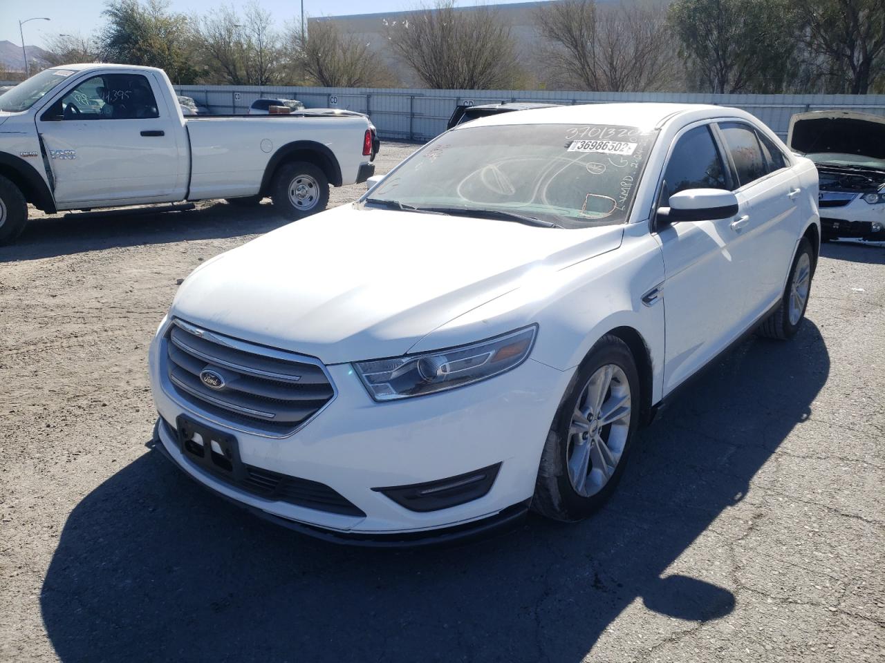 Photo 2 from auction – 2015 FORD TAURUS SEL with VIN 1FAHP2E88FG177913