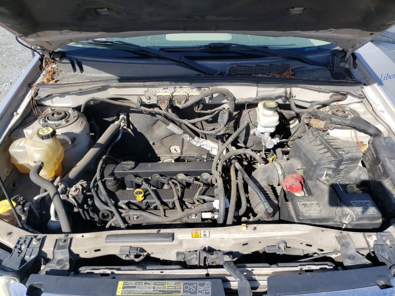 Photo 7 from auction – 2009 FORD ESCAPE XLT with VIN 1FMCU03789KA51348