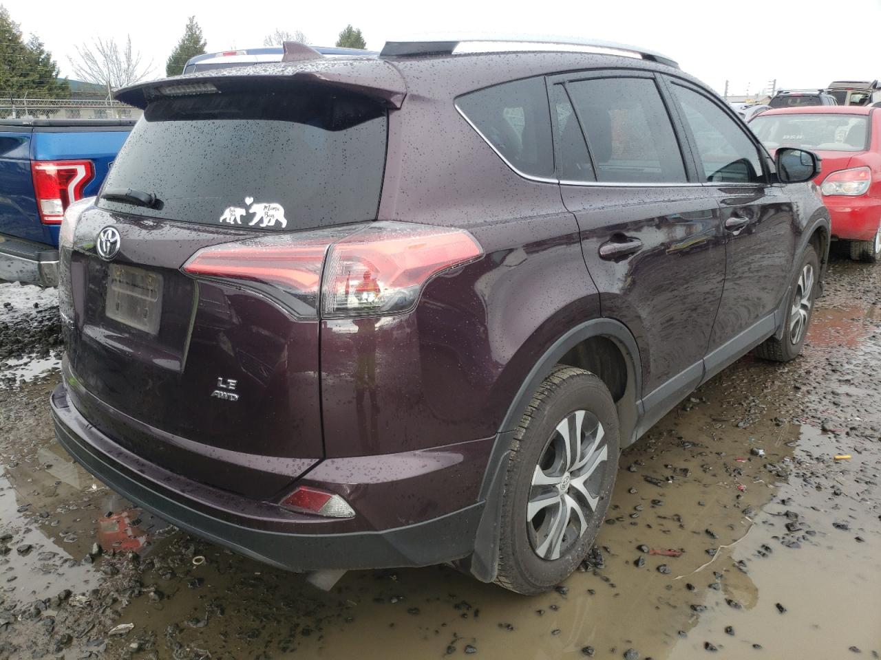 Photo 4 from auction – 2016 TOYOTA RAV4 LE with VIN 2T3BFREV1GW468115