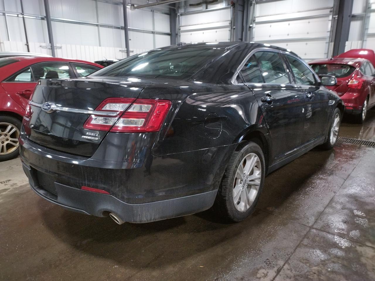Photo 4 from auction – 2015 FORD TAURUS SEL with VIN 1FAHP2E88FG140716