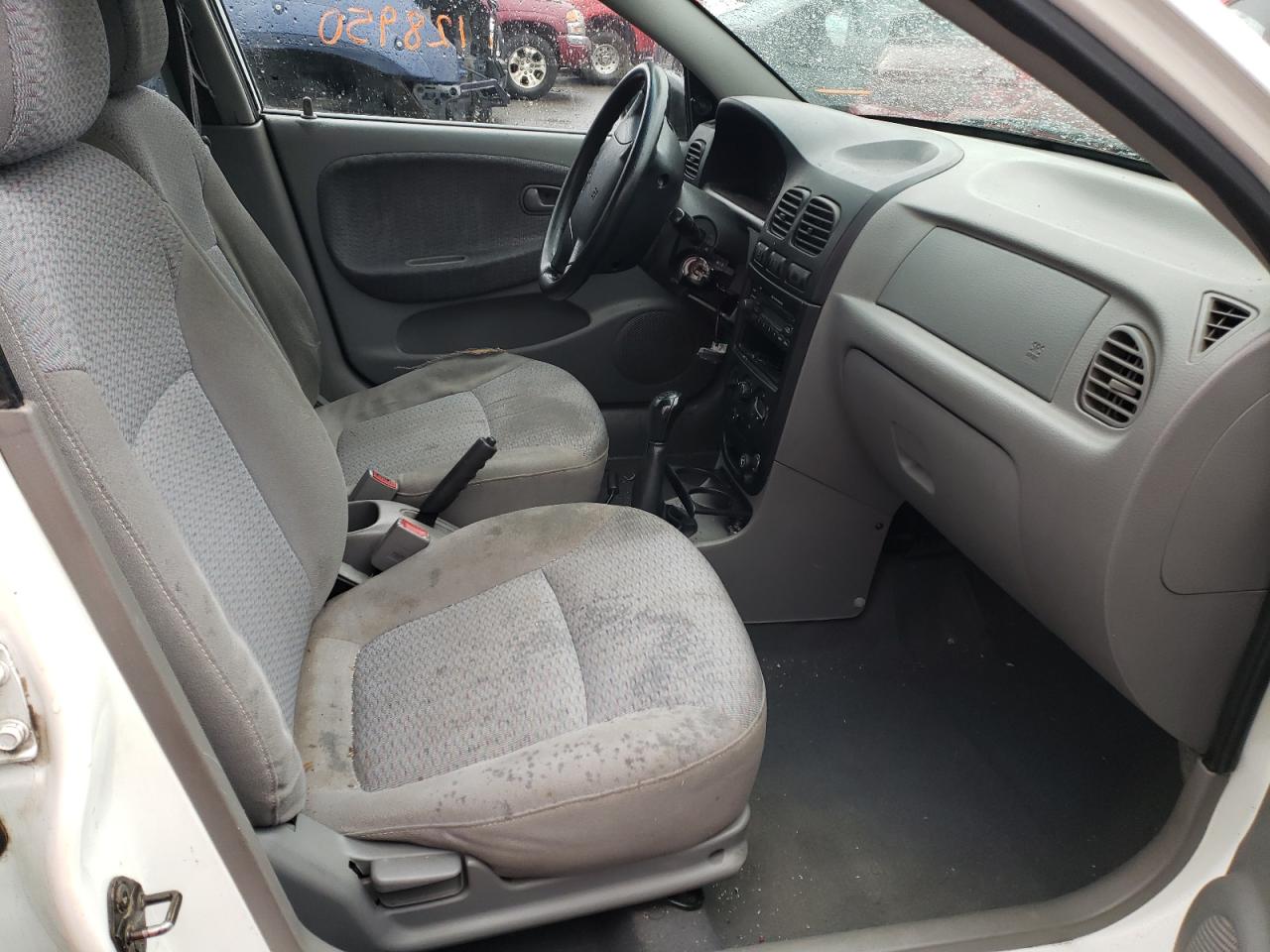 Photo 5 from auction – 2002 KIA RIO CINCO with VIN KNADC163526054794