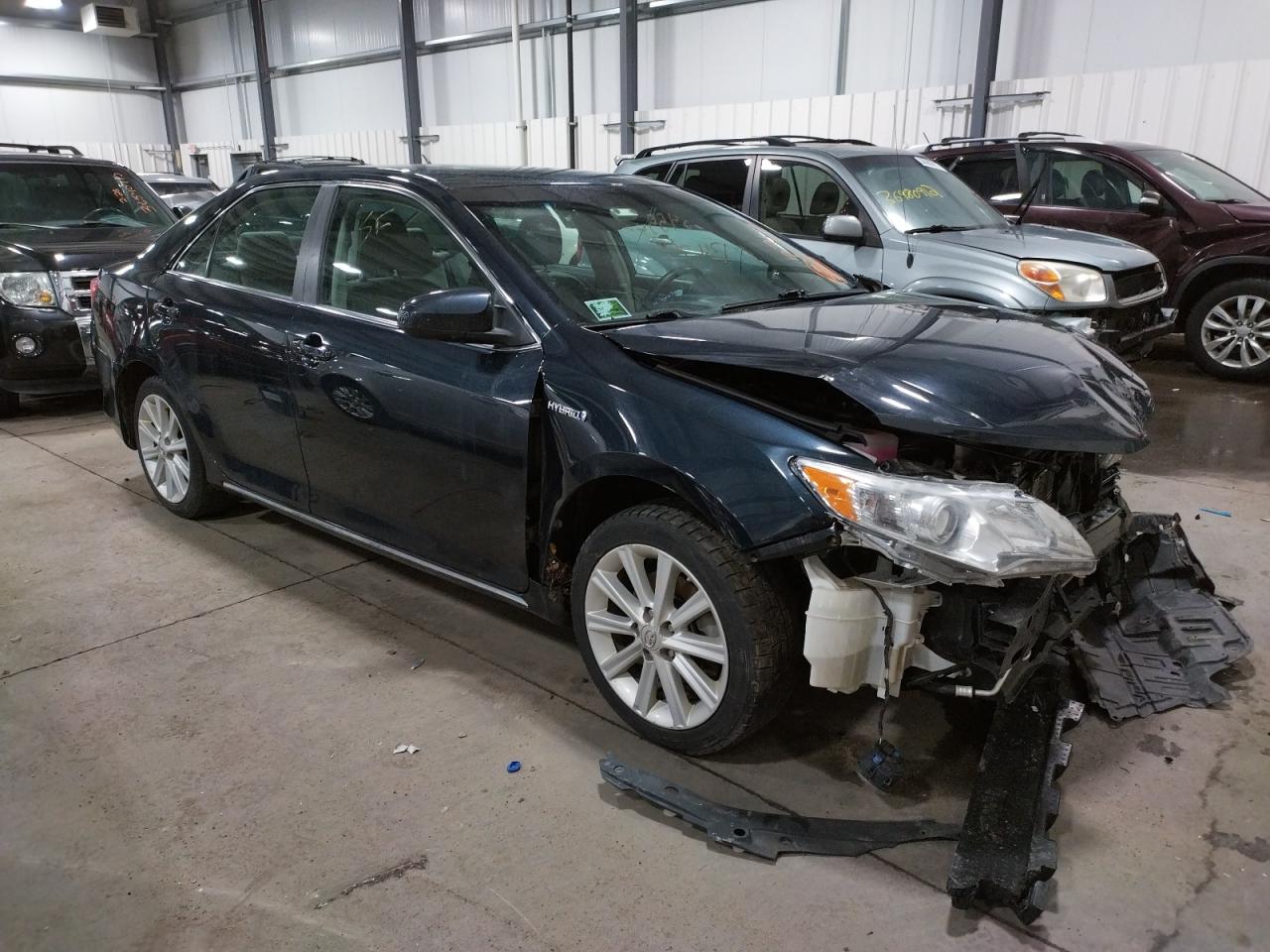 TOYOTA CAMRY HYBR 2012 with VIN 4T1BD1FK9CU051081 - Photo from auction