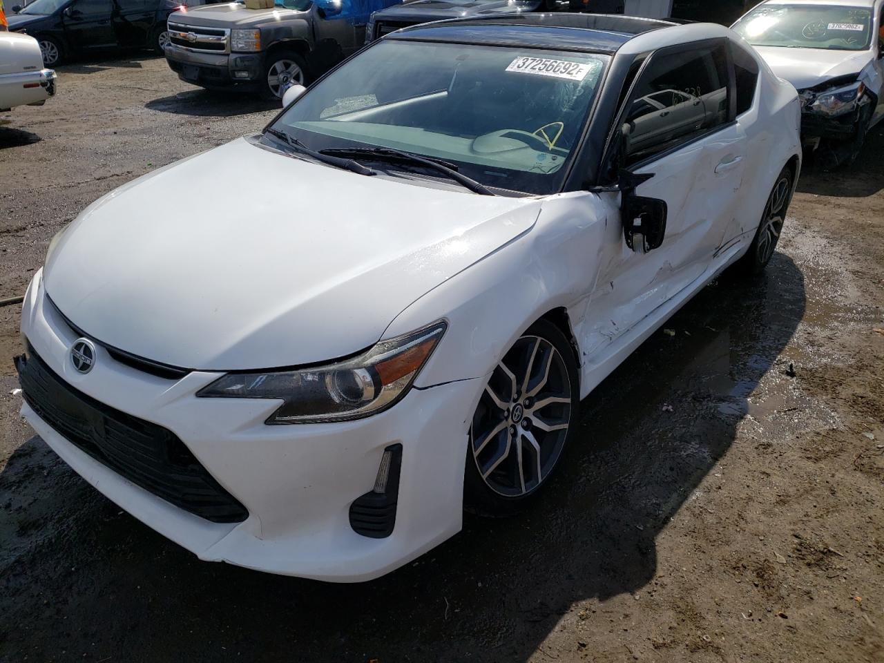 Photo 2 from auction – 2014 TOYOTA SCION TC with VIN JTKJF5C71E3080397