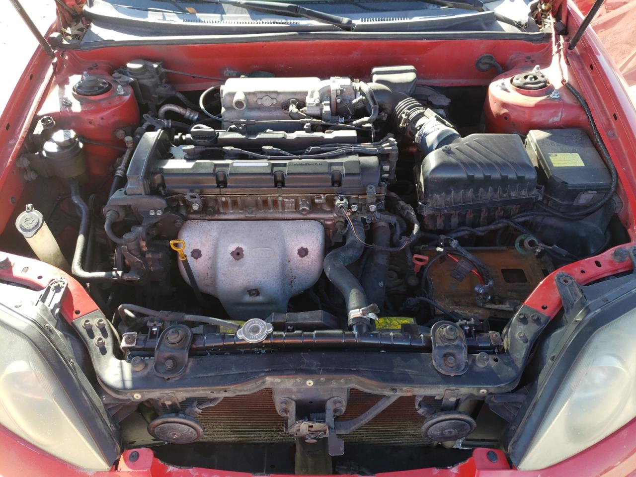 Photo 7 from auction – 2004 HYUNDAI TIBURON with VIN KMHHM65D94U152780