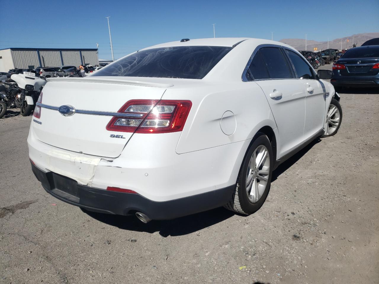 Photo 4 from auction – 2015 FORD TAURUS SEL with VIN 1FAHP2E88FG177913
