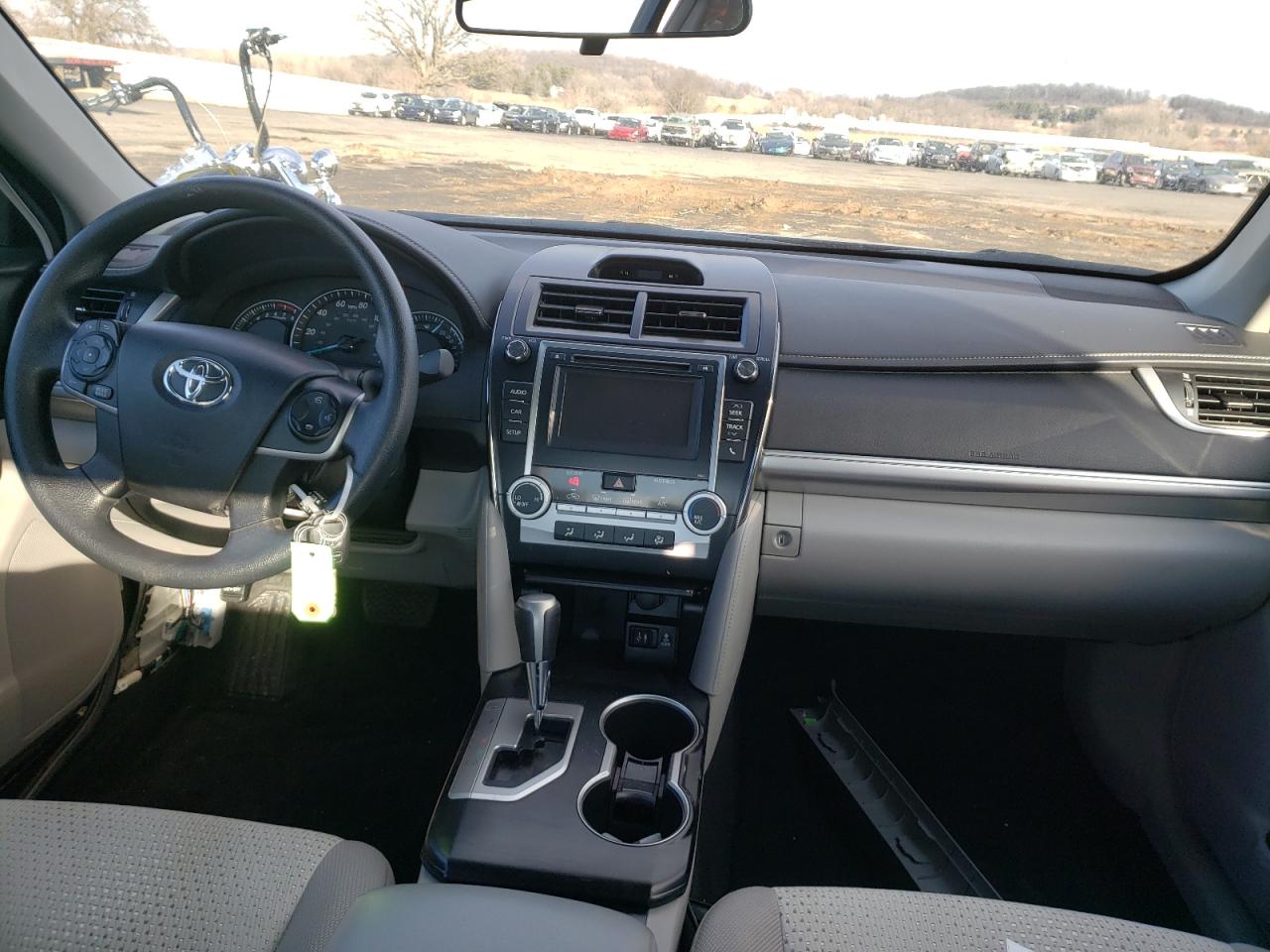 Photo 9 from auction – 2014 TOYOTA CAMRY L with VIN 4T4BF1FK8ER419060
