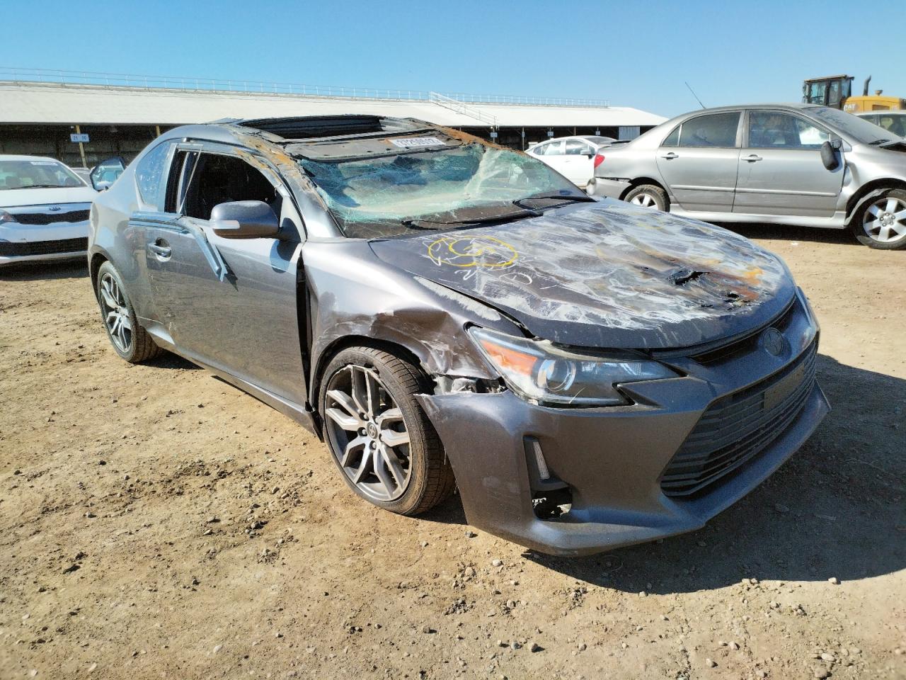 TOYOTA SCION TC 2015 with VIN JTKJF5C73FJ010512 - Photo from auction