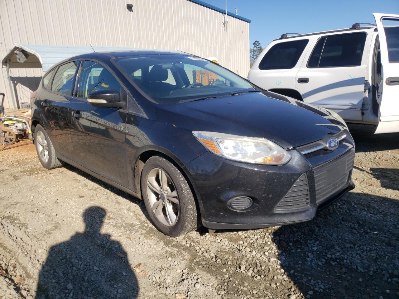 FORD FOCUS SE 2013 with VIN 1FADP3K29DL306833 - Photo from auction