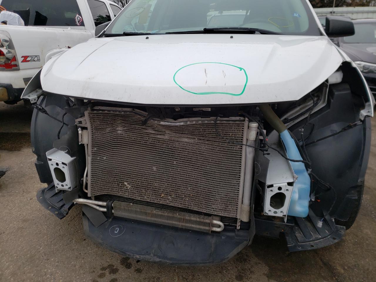 Photo 9 from auction – 2016 CHEVROLET TRAVERSE L with VIN 1GNKRFED1GJ299992