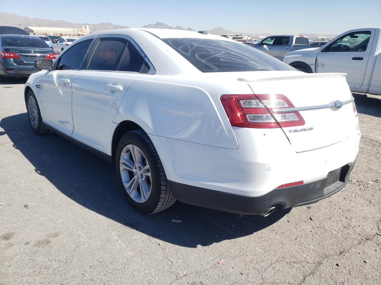Photo 3 from auction – 2015 FORD TAURUS SEL with VIN 1FAHP2E88FG177913