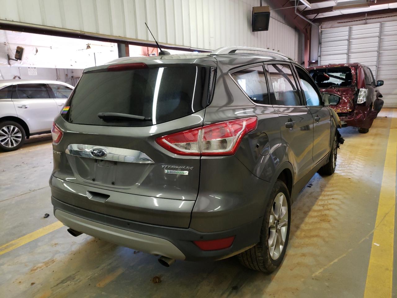 Photo 4 from auction – 2014 FORD ESCAPE TIT with VIN 1FMCU0JX5EUB73571