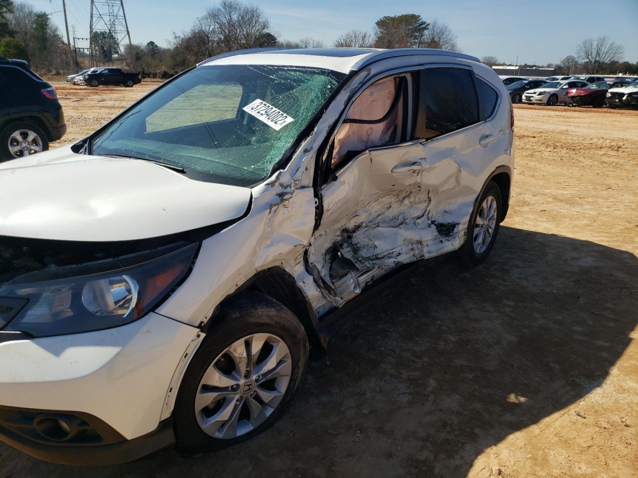 Photo 9 from auction – 2012 HONDA CR-V EXL with VIN 5J6RM3H76CL043205