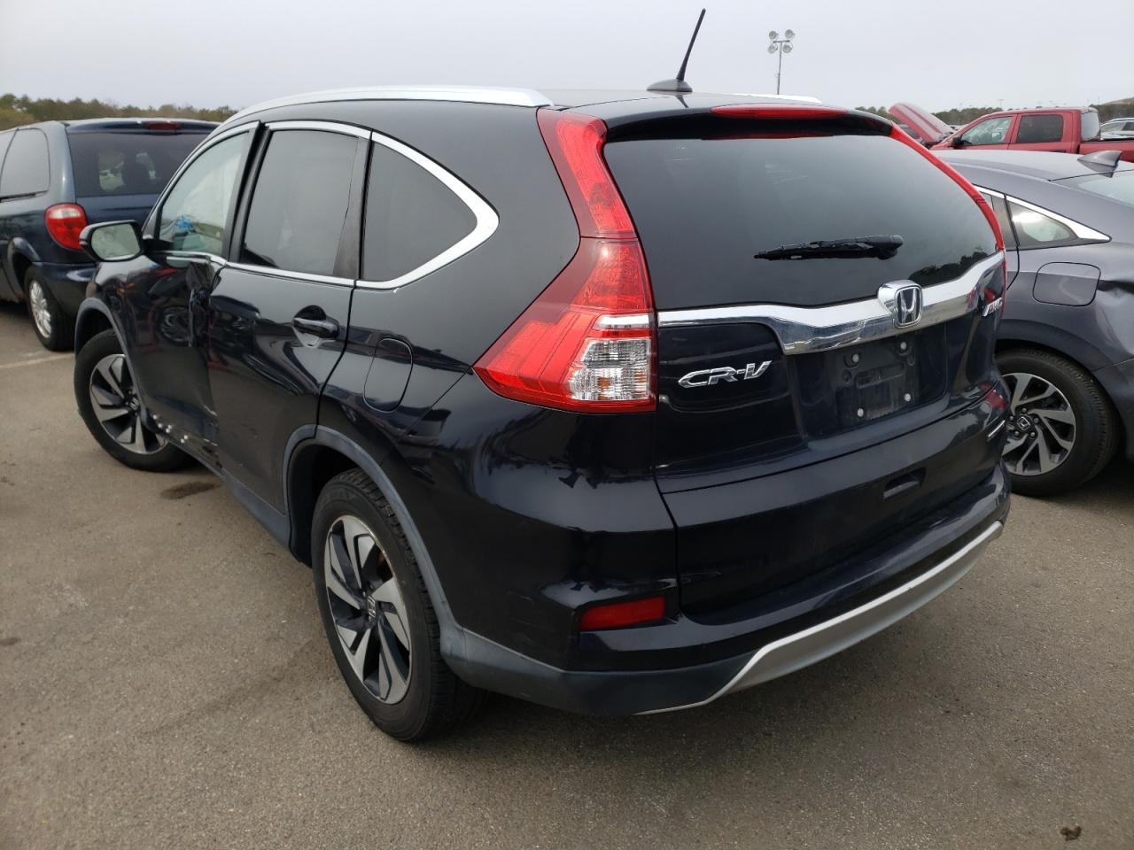 Photo 3 from auction – 2015 HONDA CR-V TOURI with VIN 5J6RM4H94FL128099