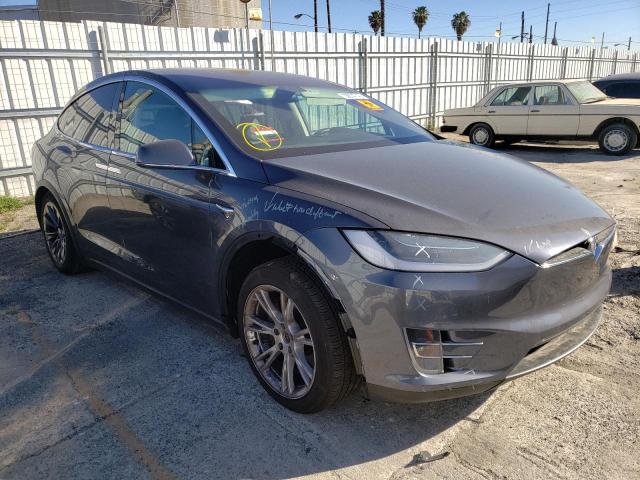 TESLA MODEL X 2018 with VIN 5YJXCAE27JF092670 - Photo from auction