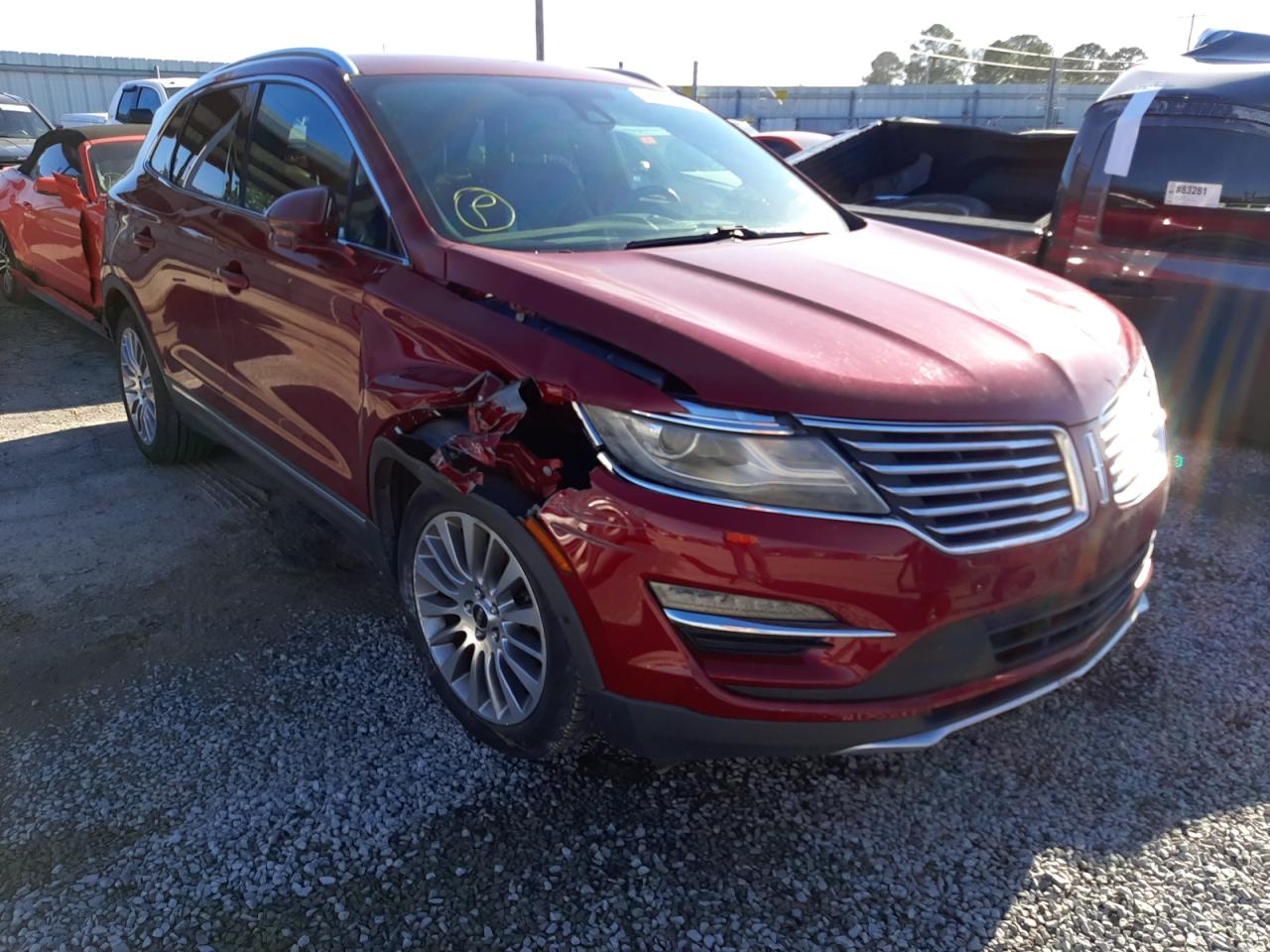 LINCOLN MKC 2015 with VIN 5LMCJ1A97FUJ03195 - Photo from auction