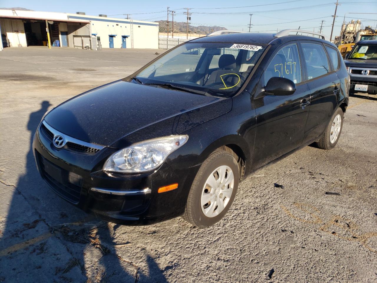 Photo 2 from auction – 2011 HYUNDAI ELANTRA TO with VIN KMHDC8AEXBU097409