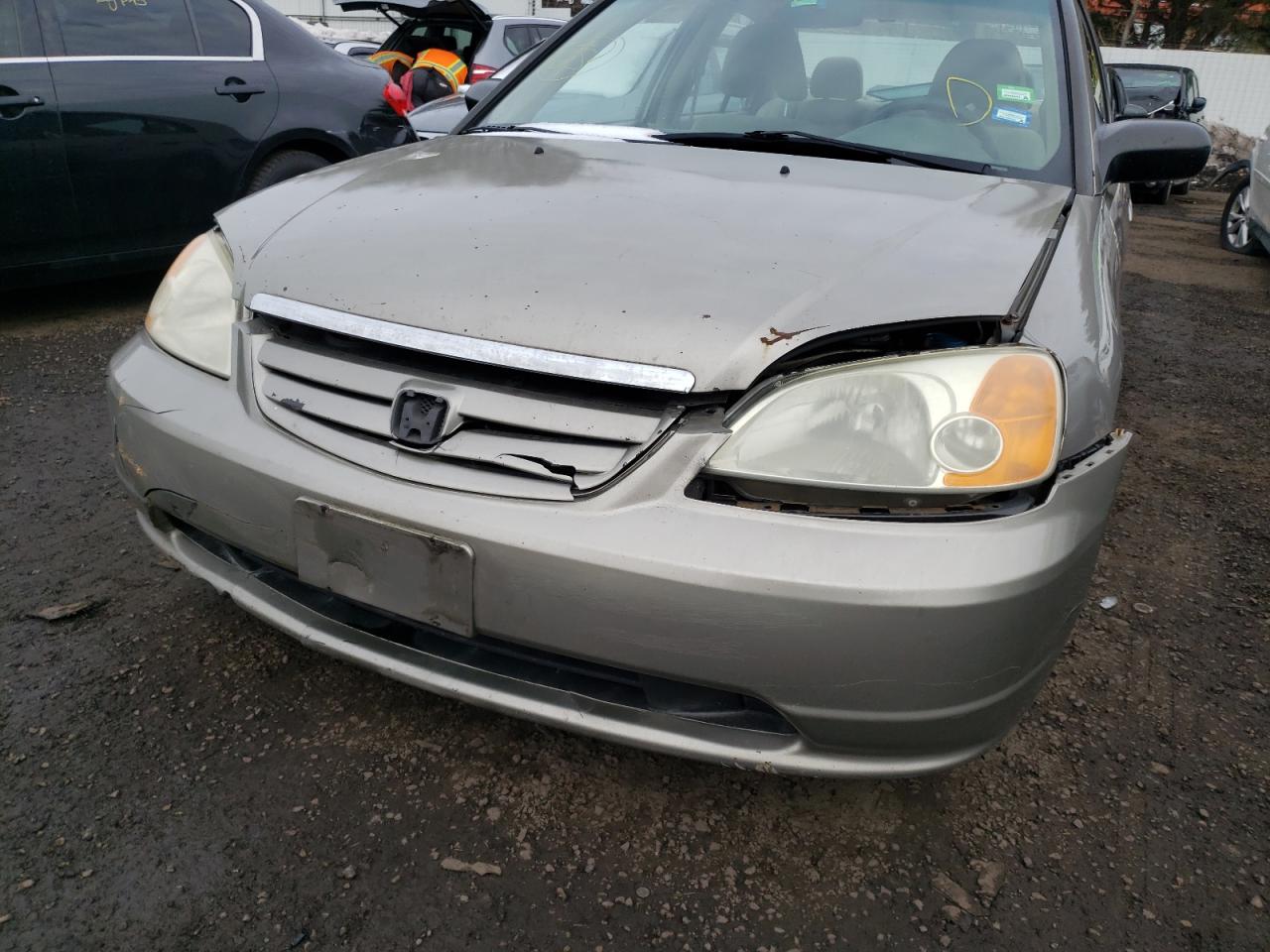 Photo 9 from auction – 2003 HONDA CIVIC LX with VIN 2HGES15573H513631