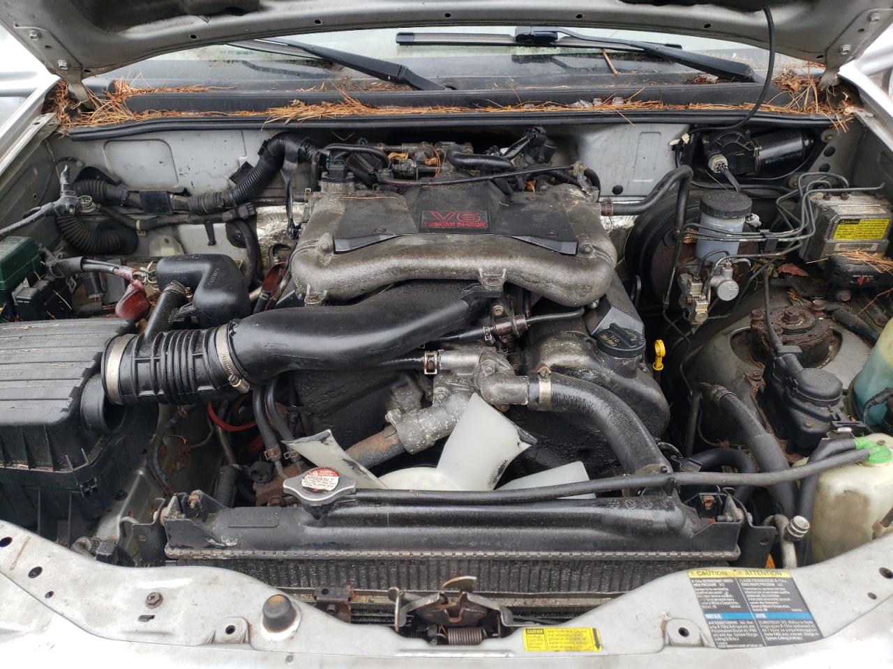 Photo 7 from auction – 2003 CHEVROLET TRACKER LT with VIN 2CNBJ634436931227