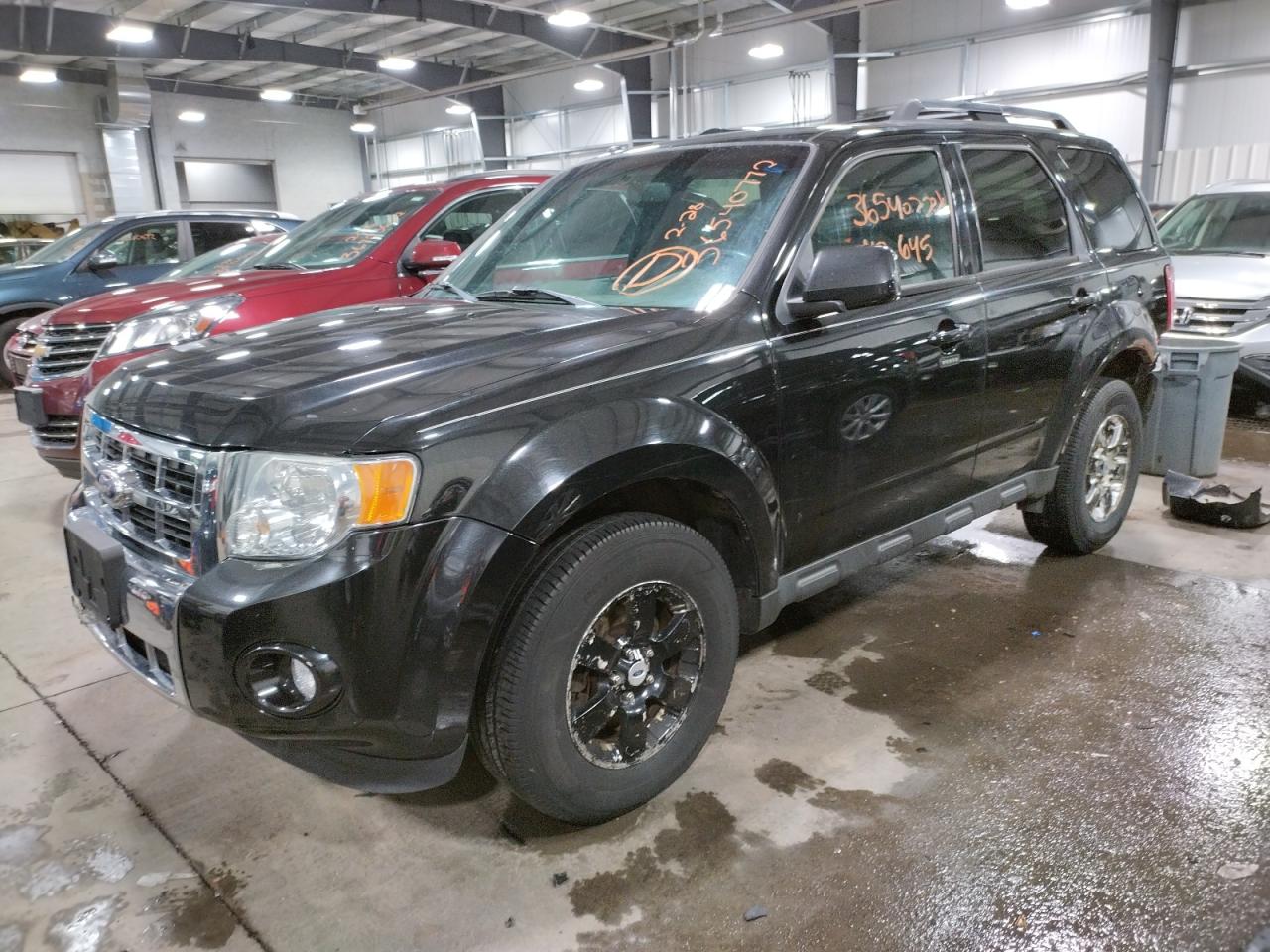 Photo 2 from auction – 2011 FORD ESCAPE LIM with VIN 1FMCU9E7XBKB02792
