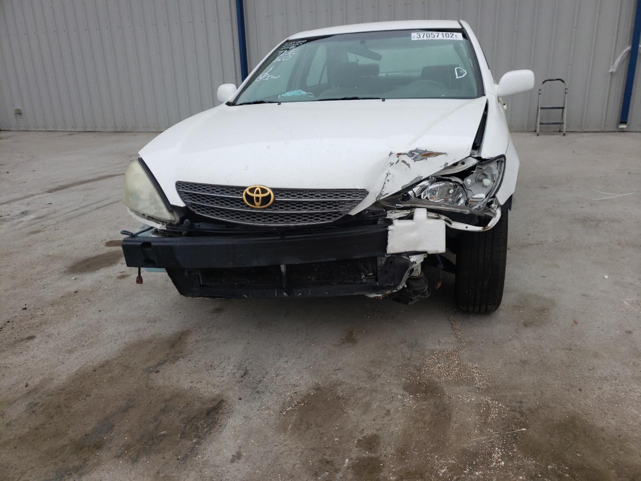 Photo 9 from auction – 2002 TOYOTA CAMRY LE with VIN 4T1BF32K72U026402