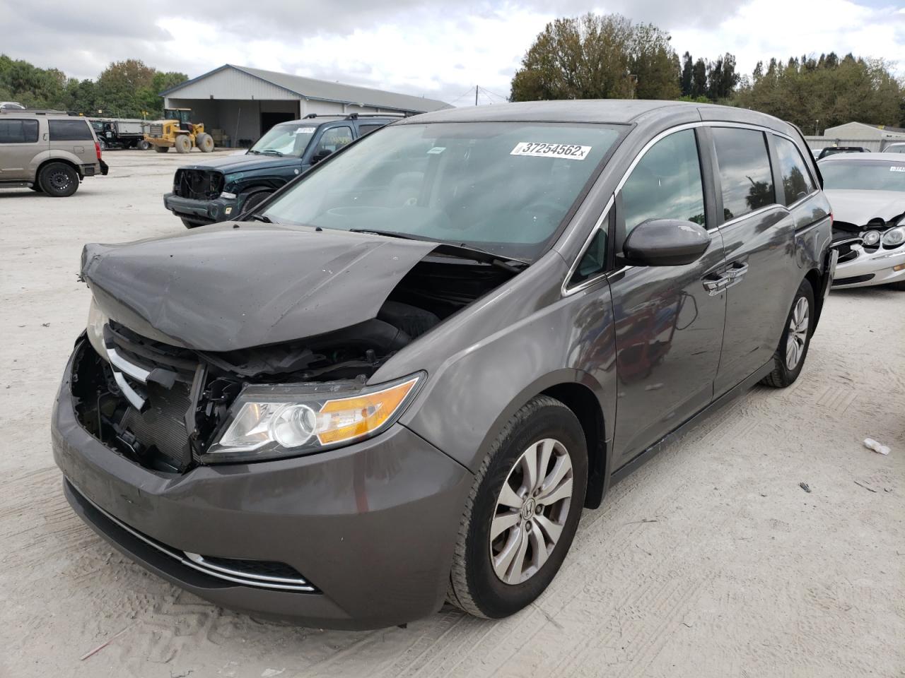 Photo 2 from auction – 2014 HONDA ODYSSEY EX with VIN 5FNRL5H40EB064986