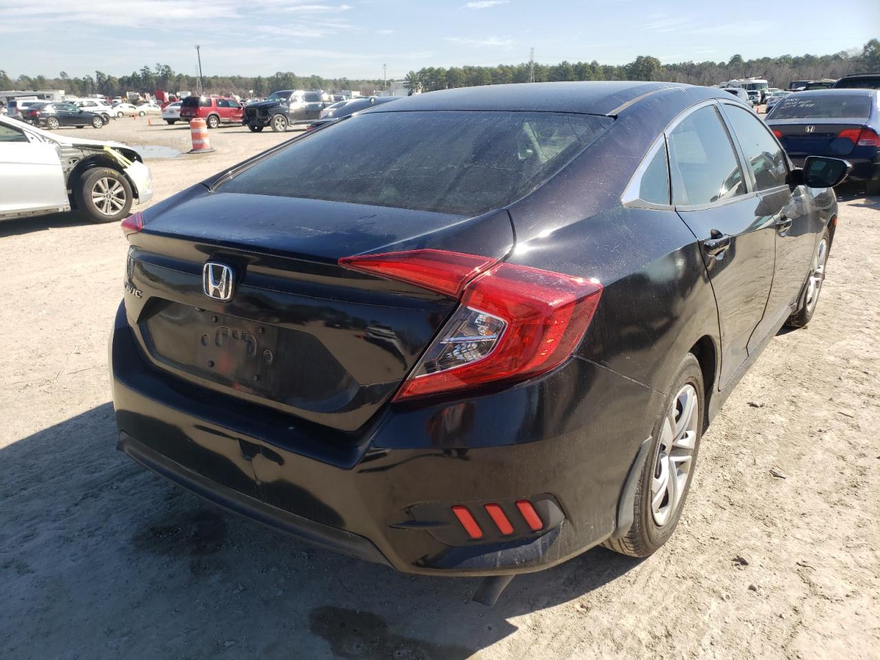 Photo 4 from auction – 2016 HONDA CIVIC LX with VIN 19XFC2F55GE044058