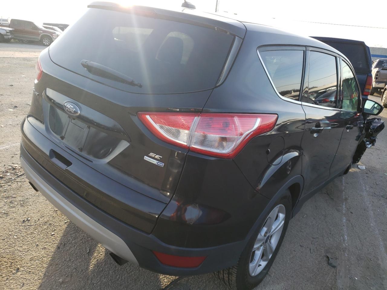 Photo 4 from auction – 2015 FORD ESCAPE SE with VIN 1FMCU9G90FUB64730
