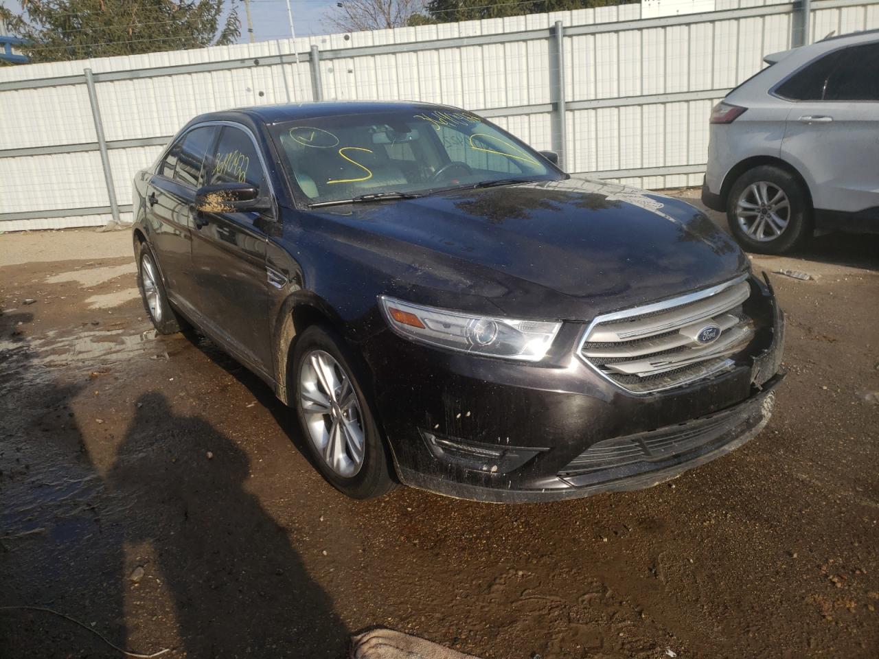 FORD TAURUS SEL 2014 with VIN 1FAHP2E88EG127138 - Photo from auction
