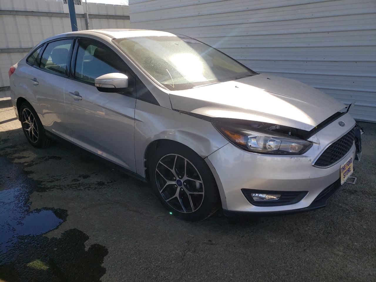 FORD FOCUS SEL 2017 with VIN 1FADP3H27HL236083 - Photo from auction