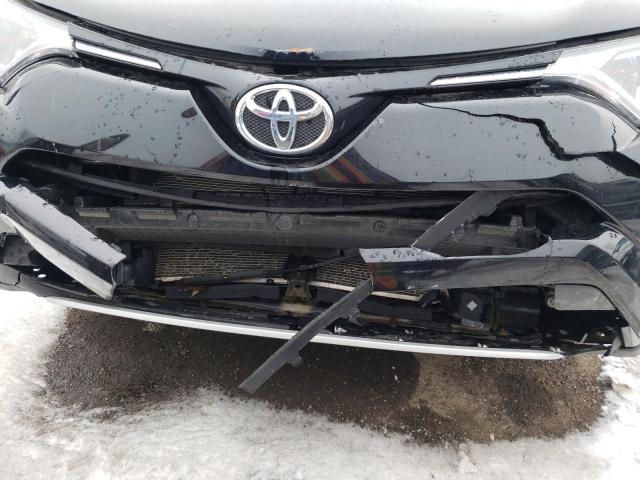 Photo 9 from auction – 2016 TOYOTA RAV4 XLE with VIN 2T3WFREV8GW301381