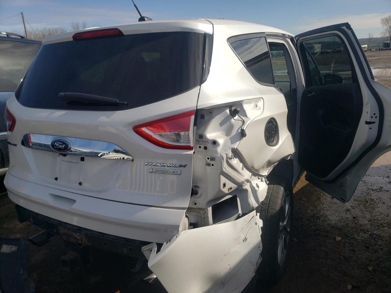 Photo 9 from auction – 2014 FORD ESCAPE TIT with VIN 1FMCU0J97EUD92470
