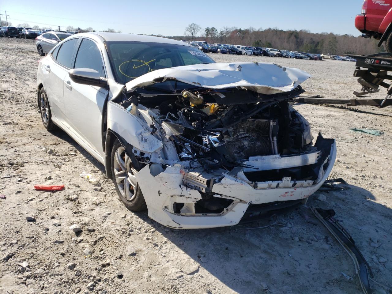HONDA CIVIC LX 2016 with VIN 19XFC2F58GE028064 - Photo from auction