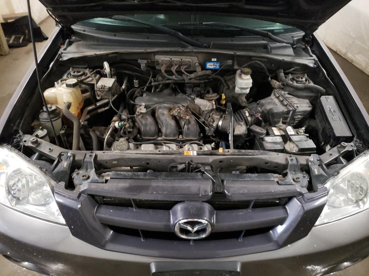 Photo 7 from auction – 2006 MAZDA TRIBUTE S with VIN 4F2CZ96196KM23695