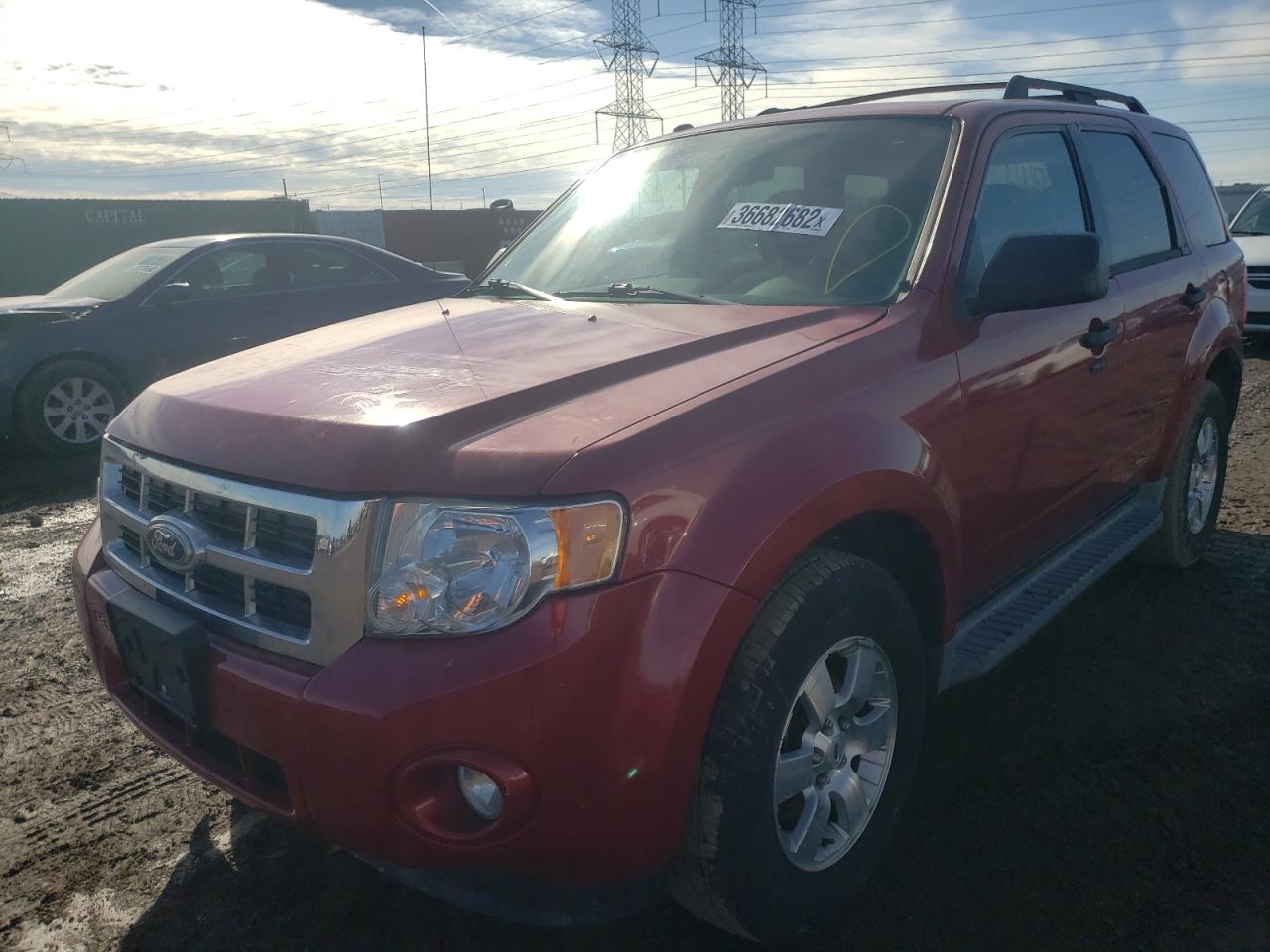 Photo 2 from auction – 2010 FORD ESCAPE XLT with VIN 1FMCU9D79AKD25325