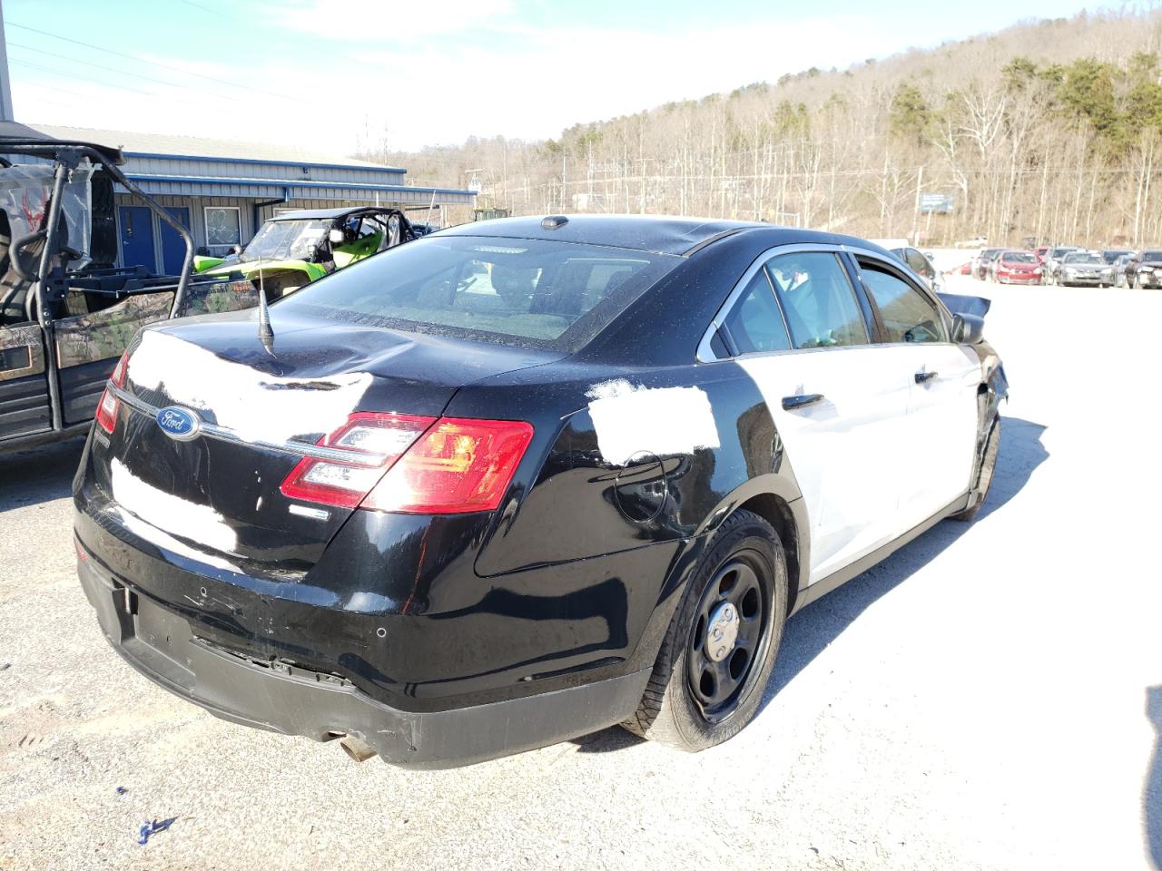 Photo 4 from auction – 2014 FORD TAURUS POL with VIN 1FAHP2MK2EG111921