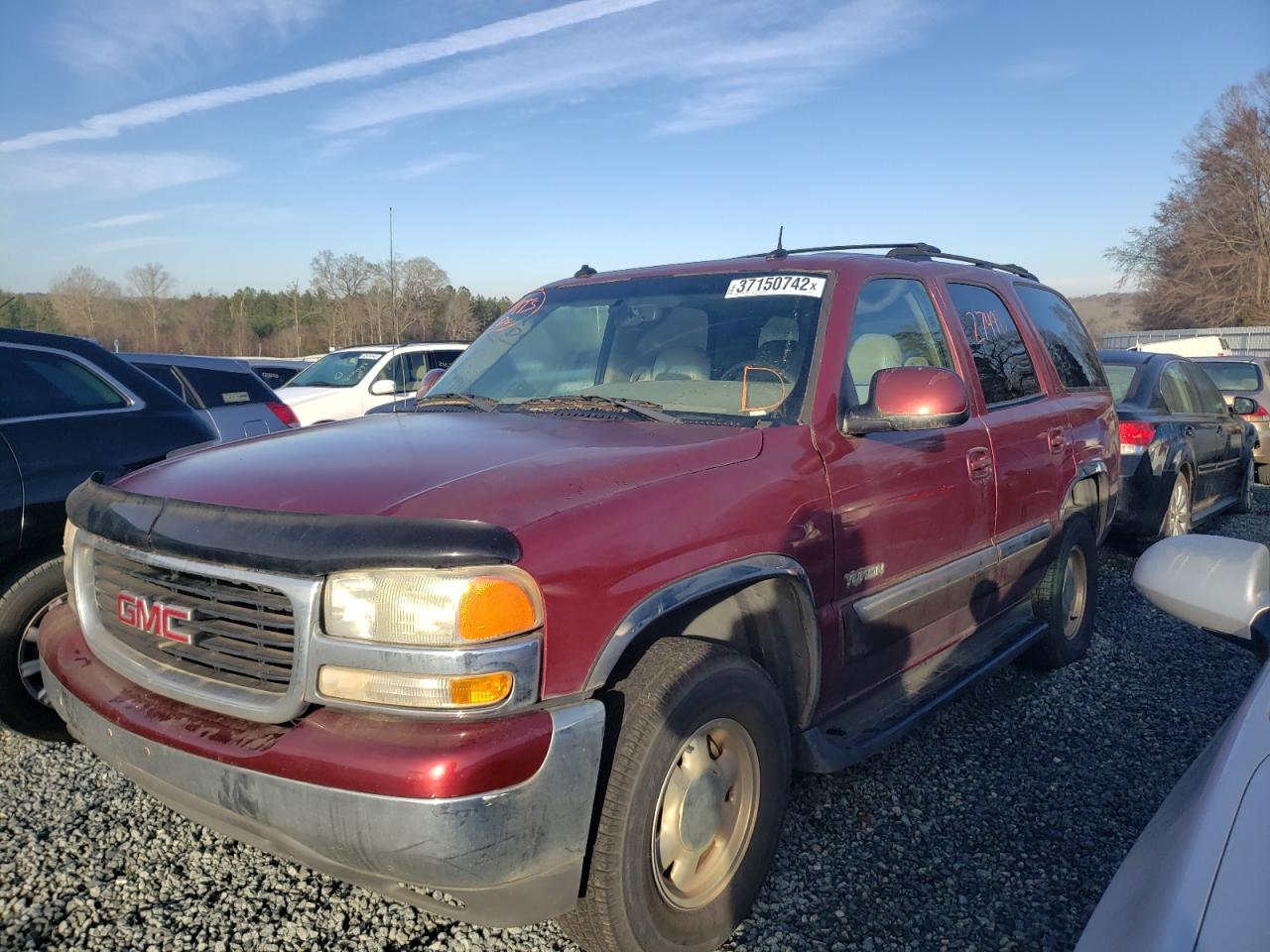 Photo 2 from auction – 2003 GMC YUKON with VIN 1GKEC13Z13J298087